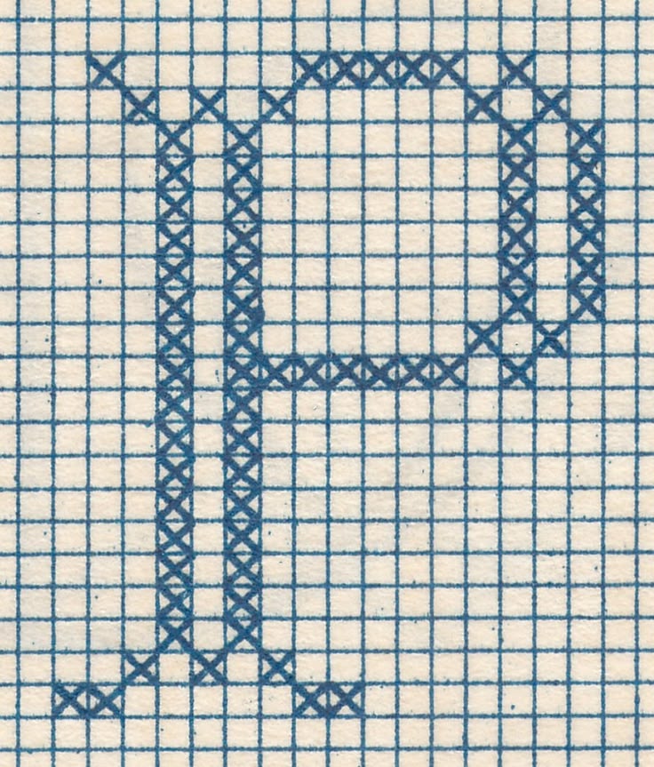 A charted cross-stitch monogram letter P on graph paper